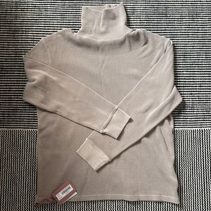 Kith pays on turtleneck thermal top